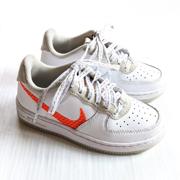 nike shoe with orange stripe